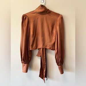 With once Wilfred top no longer available in this style!